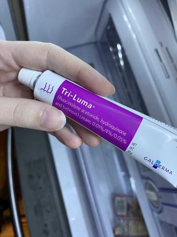 Tri Luma Reddit: Skincare serum bottle.